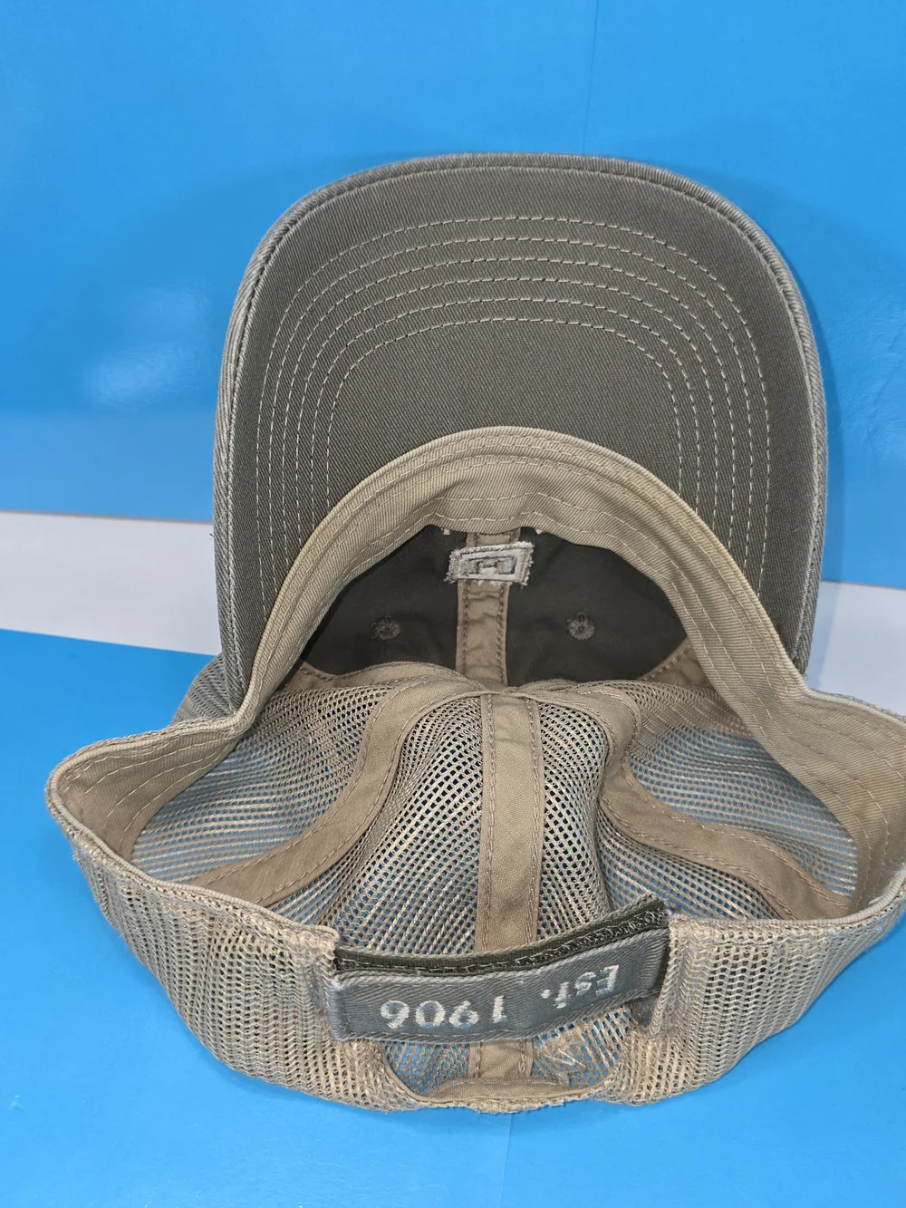 Weigand Construction Gray Tan Mesh Trucker Hat